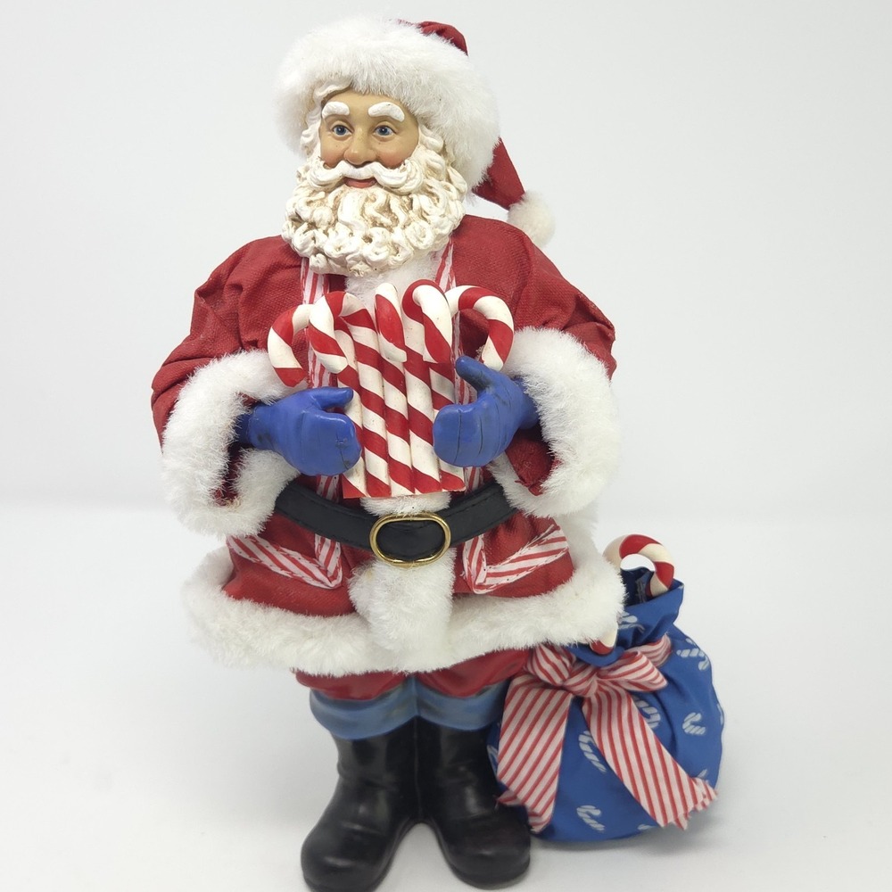 Clothtique Possible Dreams Candy Cane Carry On Santa Claus Christmas Decoration